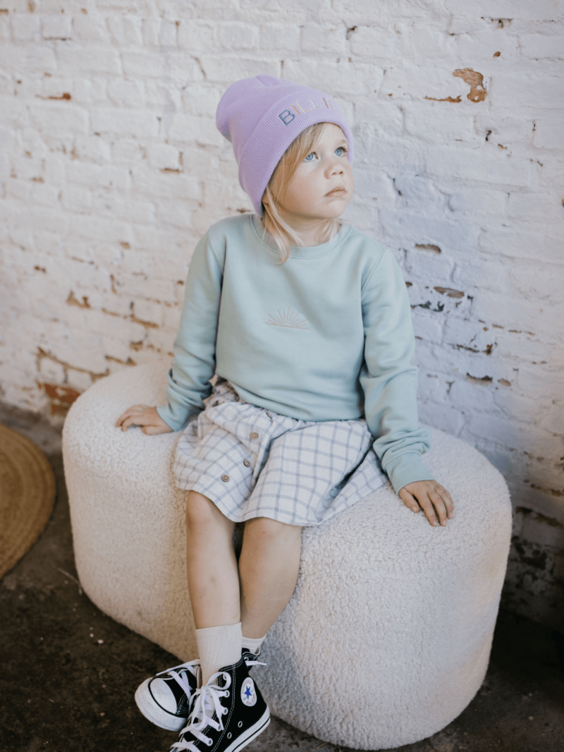 Muts met geborduurde personalisatie