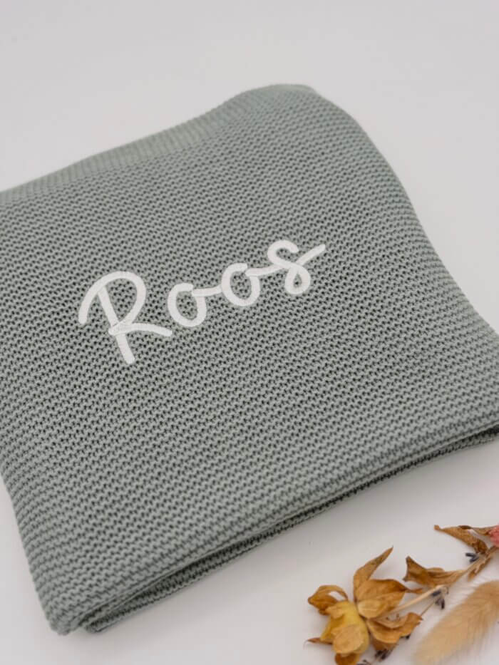 D970C18D-F5C9-491F-9C03-30678D897CB4 gebreid deken met naam